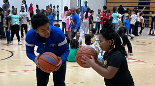 Members of the KIPP Indy Legacy's SALT program run a clinic for youth in their community