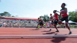 People race in a track and field event