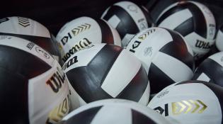 a bunch of volleyball balls
