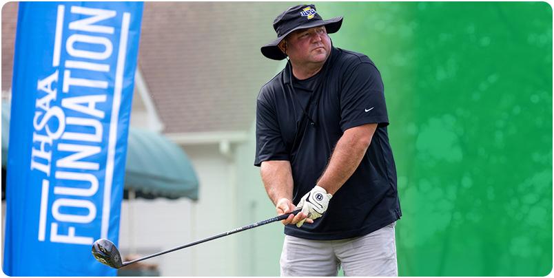 Participant at the IHSAA Foundation Golf Outing before a tee off