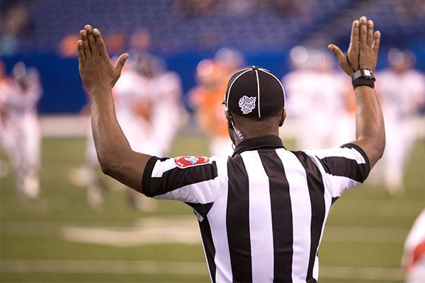 An official refereeing at an IHSAA game.