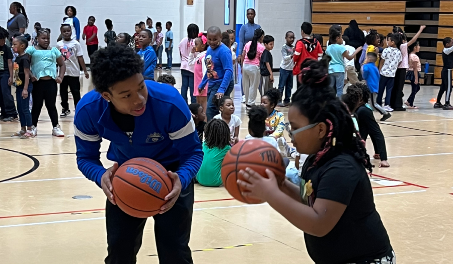 Members of the KIPP Indy Legacy's SALT program run a clinic for youth in their community