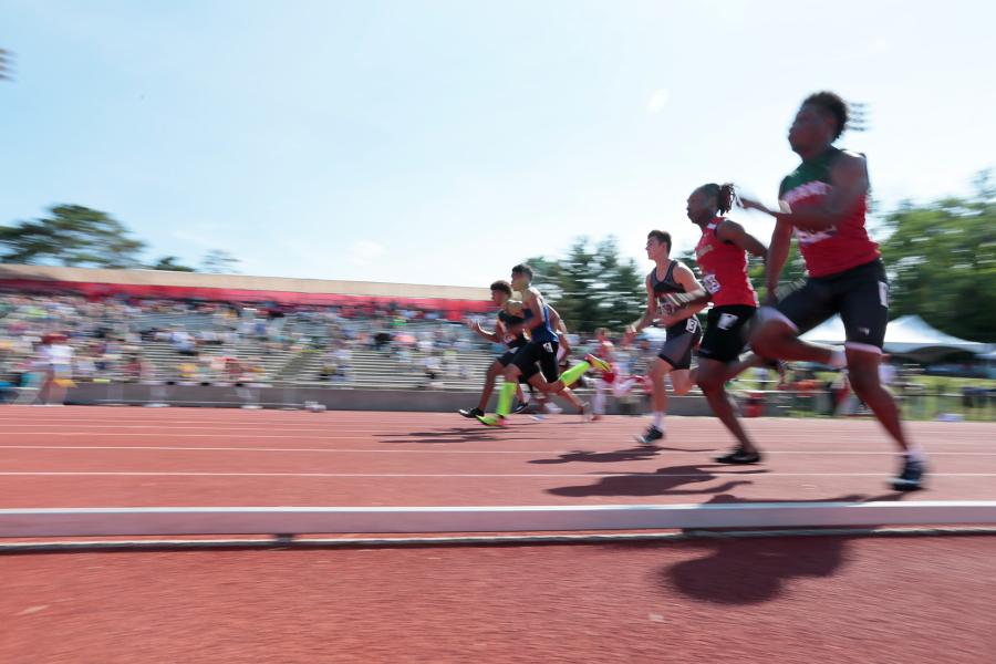 People race in a track and field event